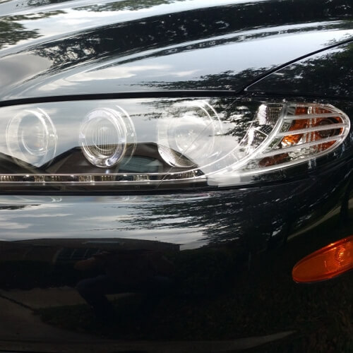 Aftermarket halo headlights on the Mazda 6