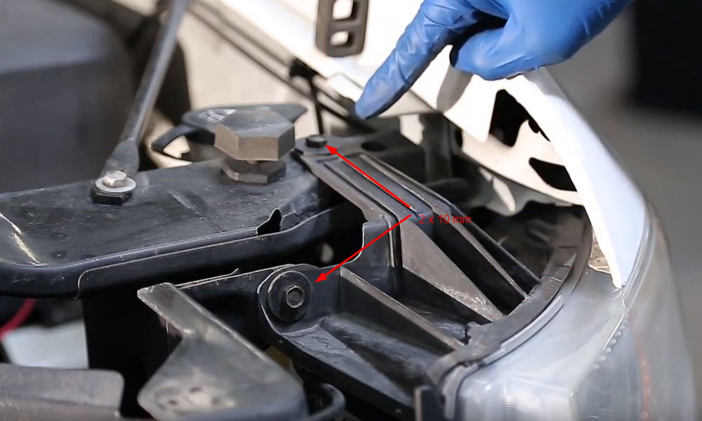 Removal of these bolts will help you uninstall the OEM headlight