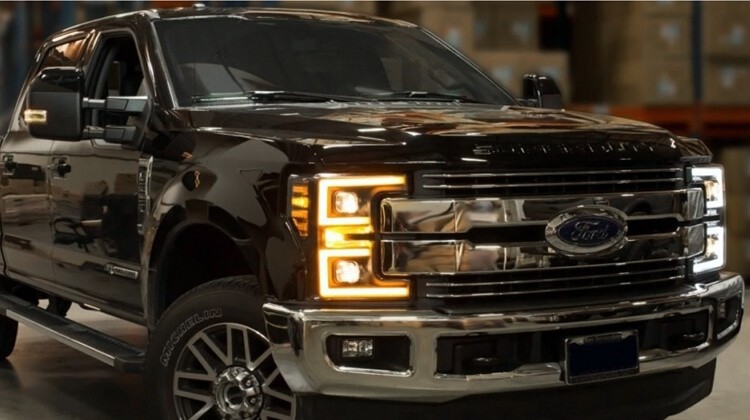 Ford F-250 with Black Aftermarket Headlights by Anzo