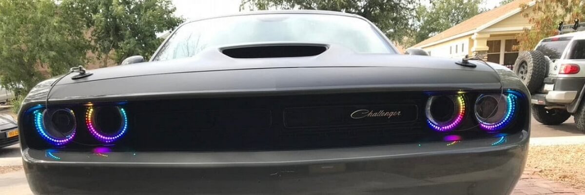 Dodge Challenger with purple headlight wrap and custom halo rings