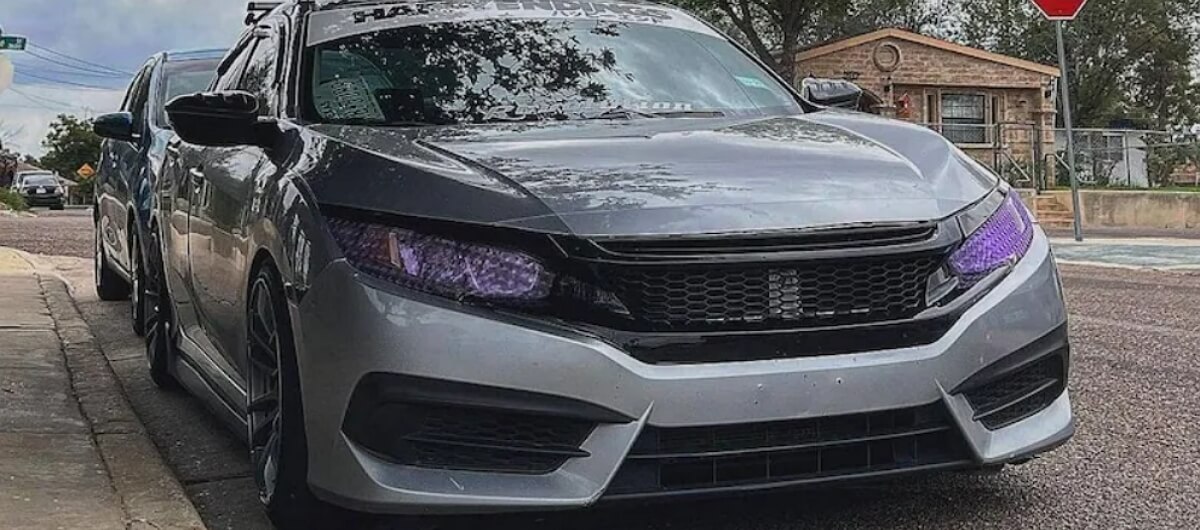 Honda Civic with purple headlight wrap