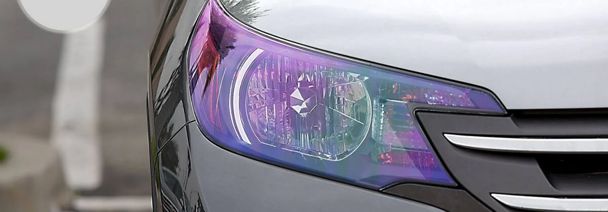 Vehicle that features headlights wrapped with purple tint